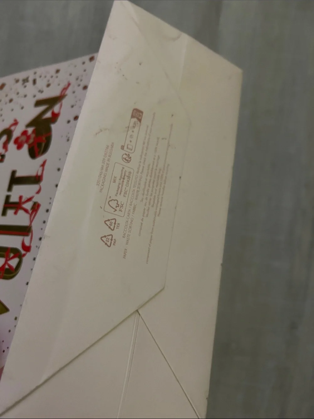 Louis Vuitton White Gift Bag with Gold Foil and Red Accents